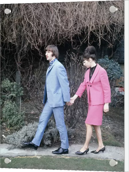 Ringo Starr walks along holding the hand of his Bride Maureen Cox 11 February 1965
