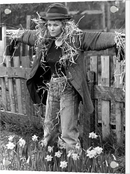 Stone the crows - a human scarecrow. Beauty queen Fran Murphy grows the prettiest flowers