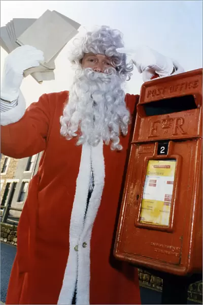 Run along to the post box! Santa - alias Peter Clifford - is warning