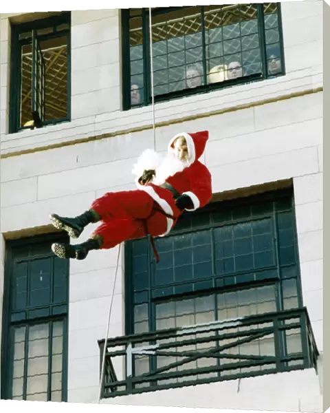 Soldier John Greenfield, dressed as Father Christmas, was abseiling down the side of a