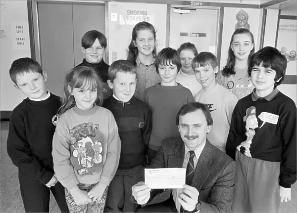Carol singers from Colne Valley schools raised £100 for Huddersfield Royal