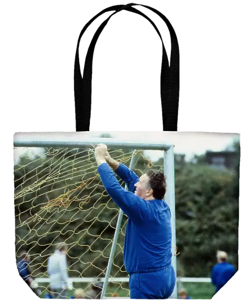 Jock Stein tying up nets to goals 1985