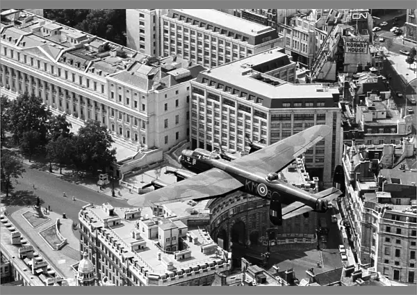 The RAFs only Lancaster bomber pictured in flight over Central London