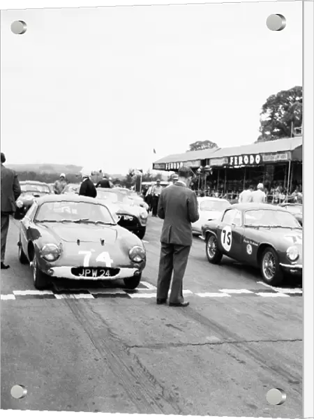 Motor car racing at Goodwood. Cars on the starting grid before the race