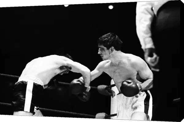 Boxing match between Jimmy Tibbs (white shorts) v Franco Macchia