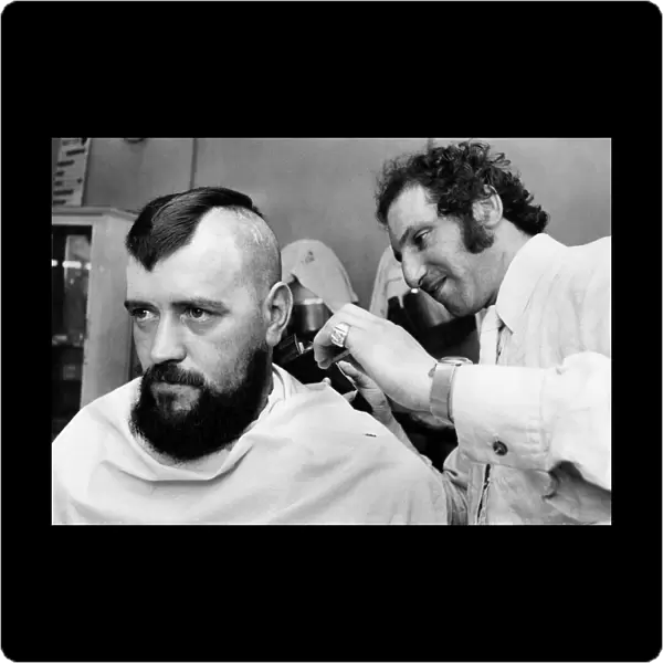 Daniel Ferran a gas fitter from Glasgow getting a mohican hair cut. 29th May 1972