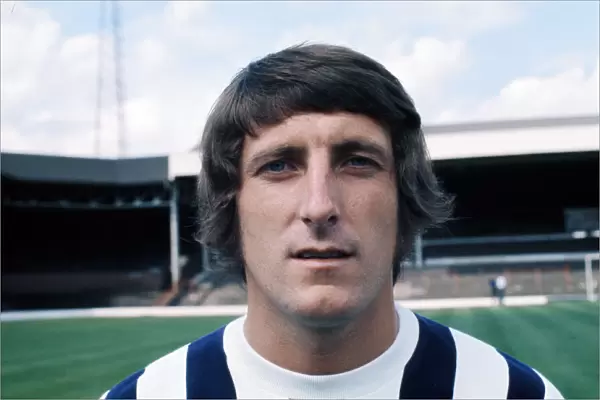 West Bromwich Albion footballer Tony Brown poses for a portrait at a photocall at The