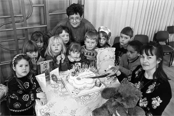 Ten years on... Mrs Lesley Holmes (right), leader of St Johns playgroup in Golcar