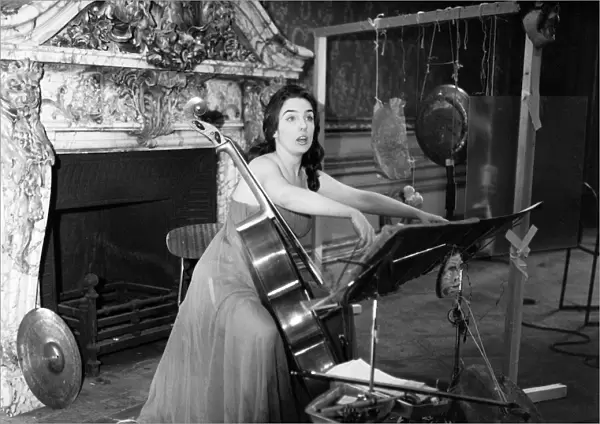 Cellist Charlotte Moorman rehearsing at 18 Carlton House Terrace for her particular sound