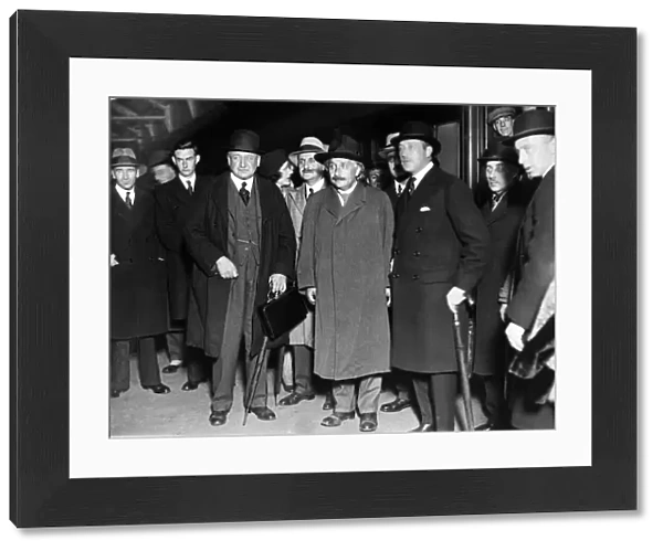 Professor Albert Einstein (centre) pictured upon his arrival at Victoria Station in