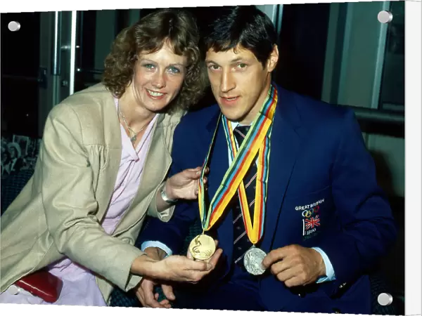 Allan Wells and his wife Margot Wells with his medals after the Moscow Olympic Games June