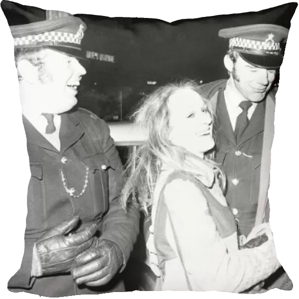 Police share a joke and a kiss with New Year revellers in Broadgate 31st December 1971