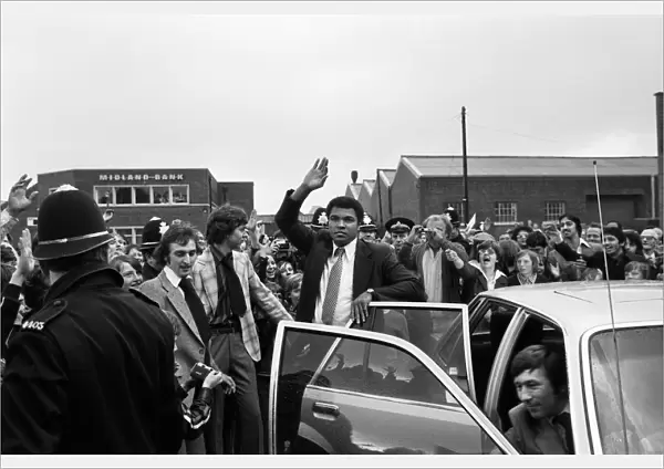 Muhammad Ali waving to fans in Birmingham. 7th June 1979