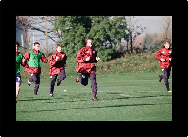 Manchester United in training. Players running left to right: Roy Keane