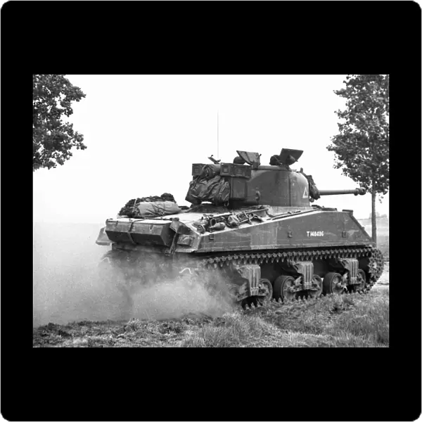 A Sherman VC Firefly tank of 24th Lancers, 8th Armoured Brigade, near St Leger