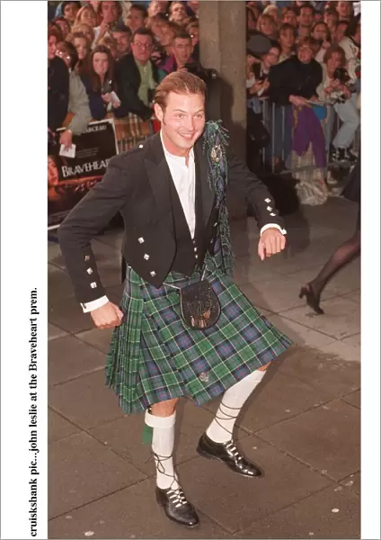 John Leslie at the premiere of the film Braveheart wearing tartan kilt Highland dress