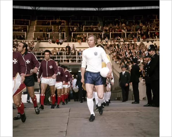England v Malta, Wembley Stadium, 10. 05. 71. England captain Bobby Moore leads