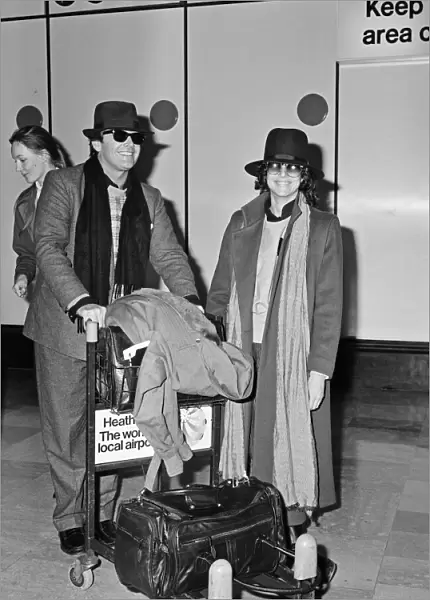 Jack Nicholson and Debra Winger arrive in London. 25th February 1984