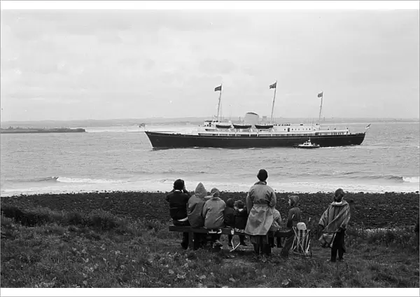 Spectators await the Royal Yacht during the Queens visit to Teesside Silver Jubilee tour