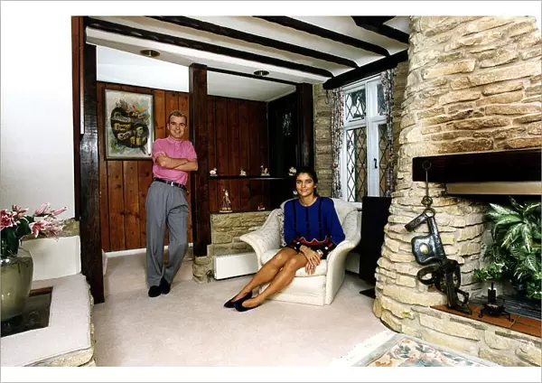 Wayne Dobson Magician with Karen Dobson in cottage living room Dbase A©Mirrorpix