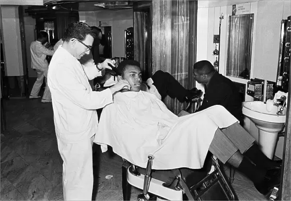 Cassius Clay aka (Muhammad Ali) getting shave in London
