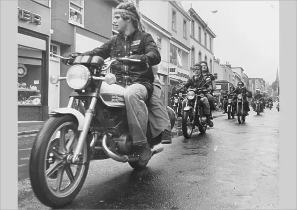 2000 Motorcycle Action Group members ride down Union Street