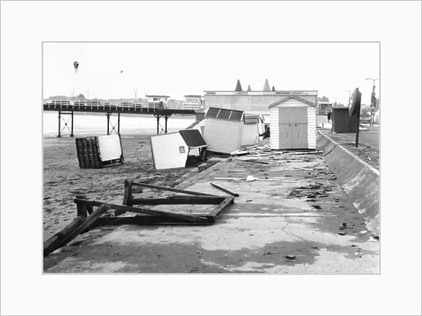 Wrecked beach huts on Paignton beach in March 1973