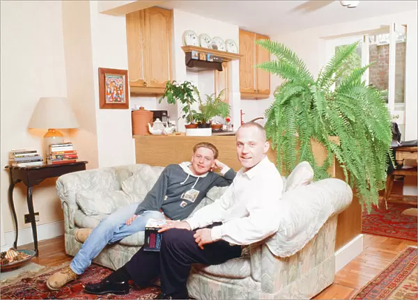 Michael Cashman, actor and partner Paul Cottingham, pictured at home together in Bow
