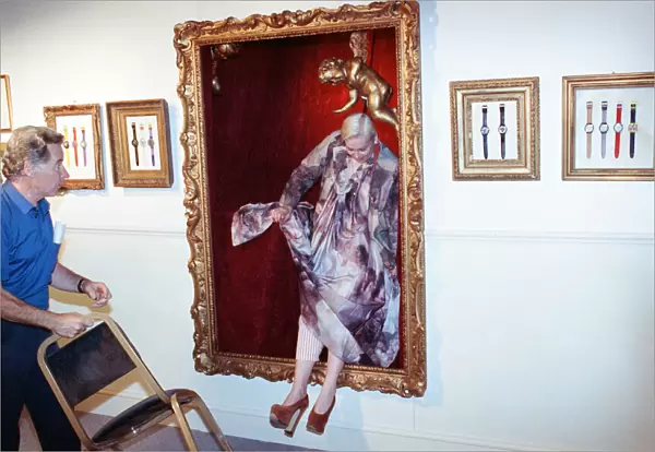 British fashion designer Vivienne Westwood, posing as an oil painting and jumping out