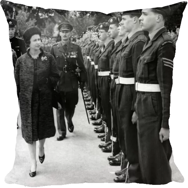Queen Elizabeth II during her visit to Solihull School, The Queen, escorted by Capt