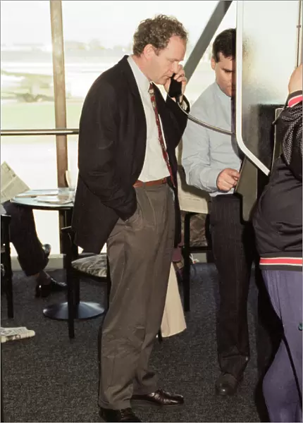 Martin McGuinness and colleague leave Heathrow Airport. 23rd October 1994