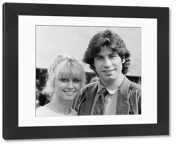 John Travolta and his co star Olivia Newton John in England during the week of release of