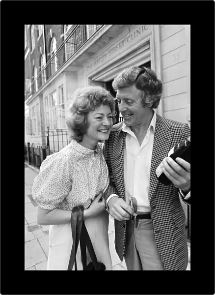 Michael Aspel and his wife Lizzie Power leaving a Harley Street Clinic. 5th June 1982