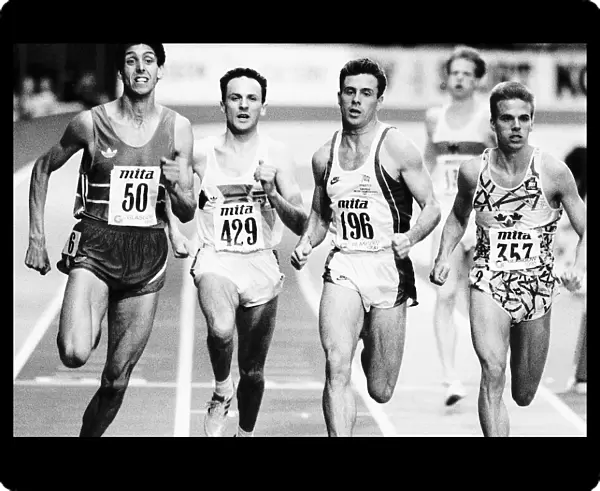 British runner Tom McKean on racetrack alongside competitors athletics. 25th July 1990