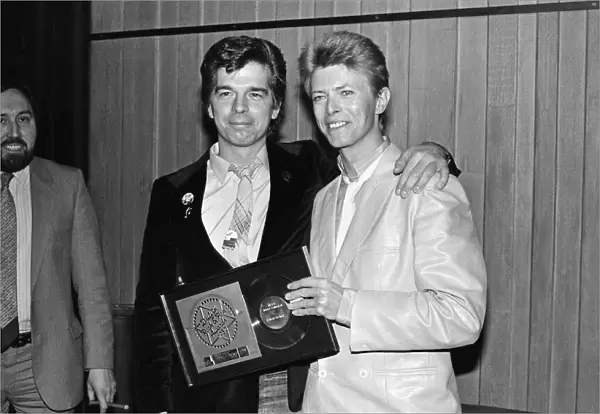 David Bowie (right) at the British Rock and Pop awards. He was named the best male singer