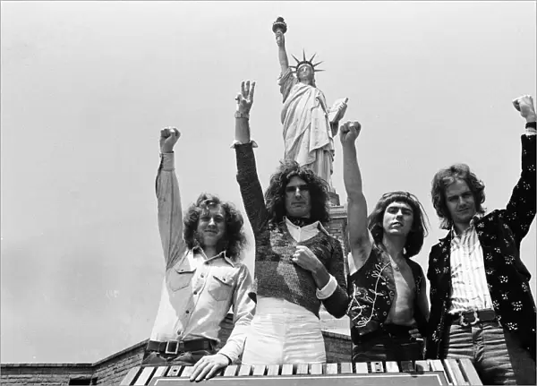 One of Britains top pop groups Slade are pictured on their way to visit the Statue