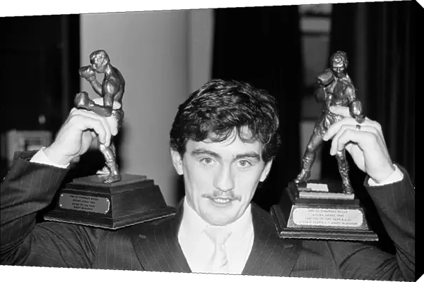 Boxer Barry McGuigan with his awards for Boxer and fight of the year