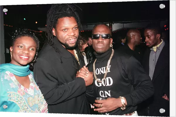 Left to right, unnamed guest, Jazzie B of Soul II Soul and Mark Morrison at The Brit