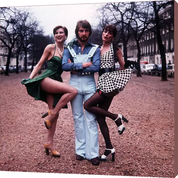 Alan Hudson Football player for Chelsea poses with models Renate & Cindy msi