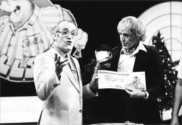 Rod Hulll and Emu seen here with Jim Bowen during a cheque presentation to the NSPCC