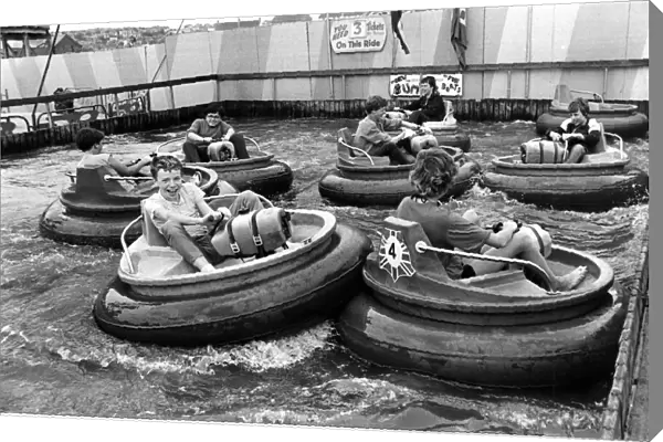 Barry Island - Children enjoy their time on the bumper boats at the funfair at Barry