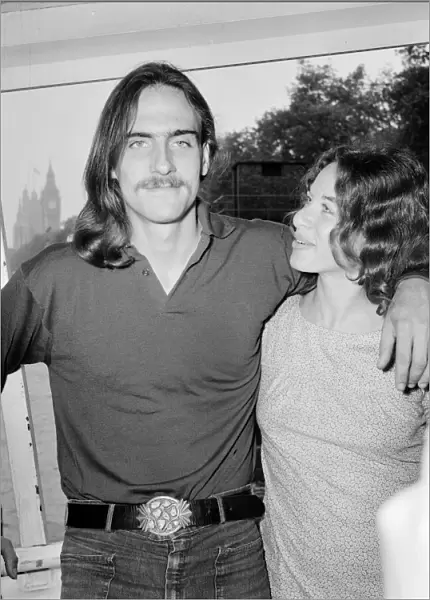 Carole King and James Taylor, both singer  /  songwriters, together for a press conference at