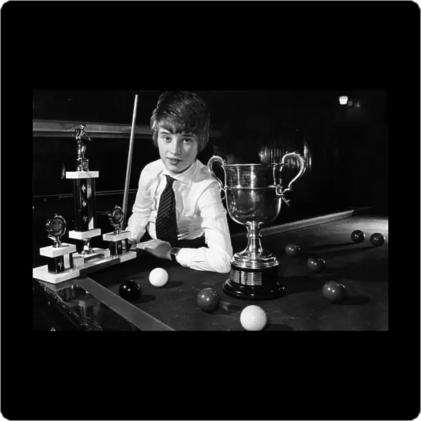 A young Stephen Hendry poses with some of his trophies shortly after becoming the first