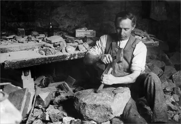 A man making stone models from rock, Cornwall. One of the industries of Penzance is