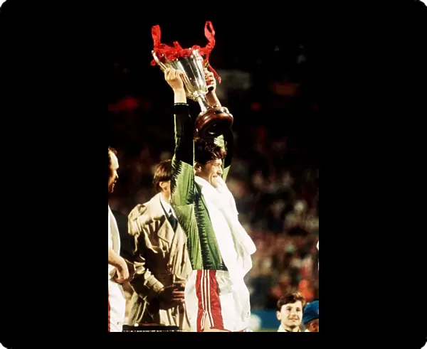 Les Sealey Manchester United goalkeeper holding aloft the European Cup Winners Cupafter