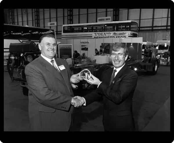 Coach company operator Harry Shaw (left) received the 15