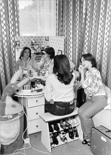 The Nolan sisters at home in Ilford. Anne and Maureen in a bedroom getting ready