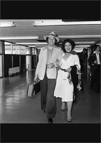 Johnny Dankworth and Cleo Laine at Heathrow Airport. 14th August 1975