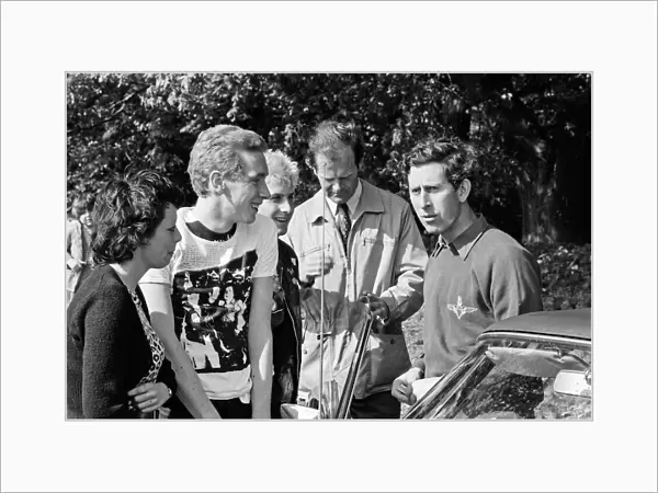 Prince Charles meet Punks Anne Wobble, 17, Tony Waterman, 17, and Phil Sick, 19