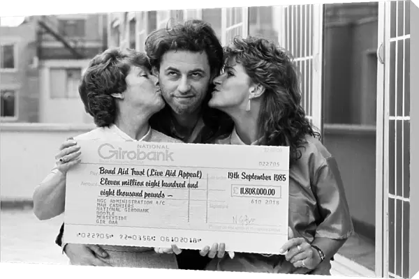 Live Aid fundraising star Bob Geldof was presented with a giant National Girobank cheque